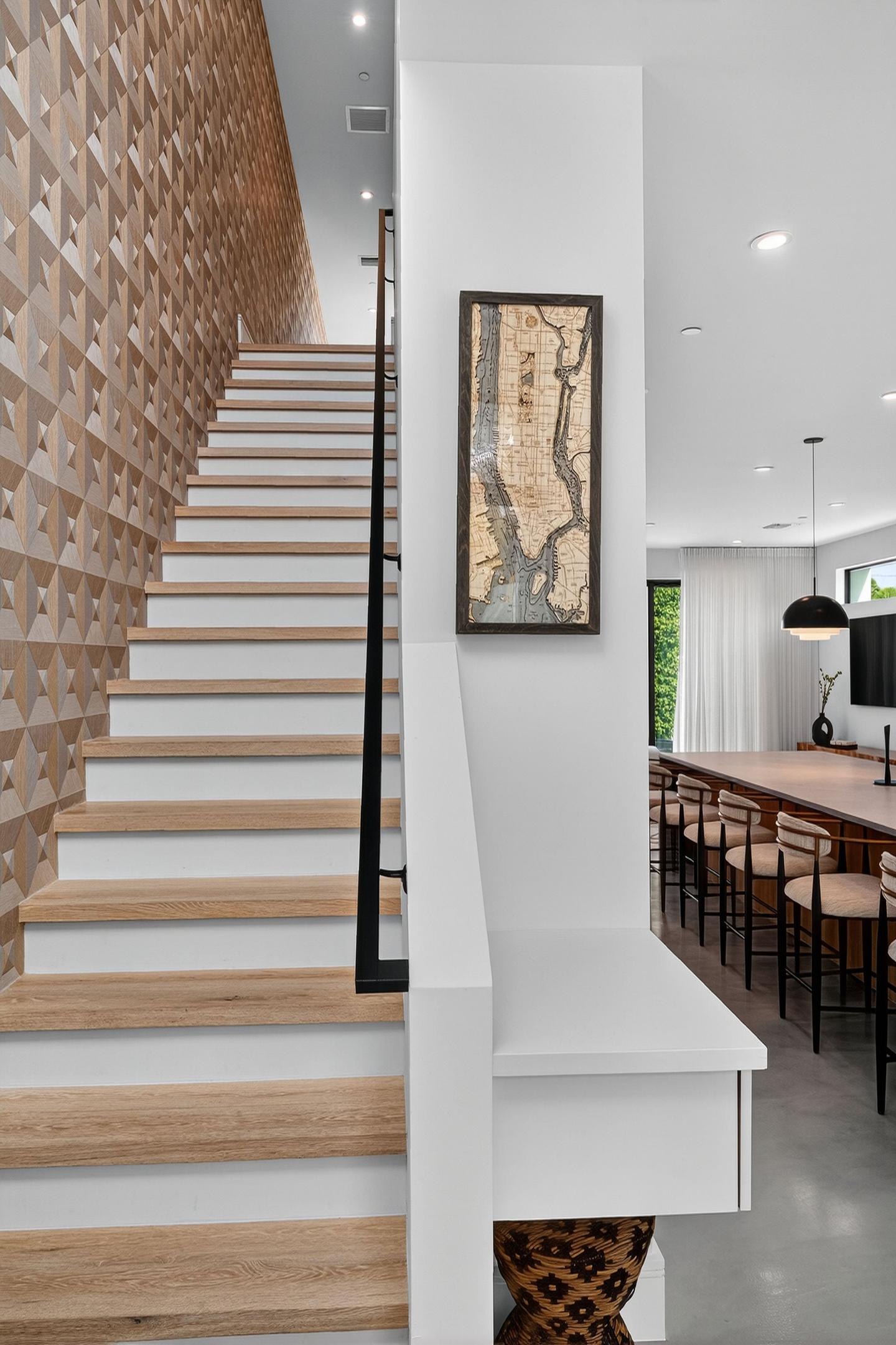 Entry hall with geometric staircase detail