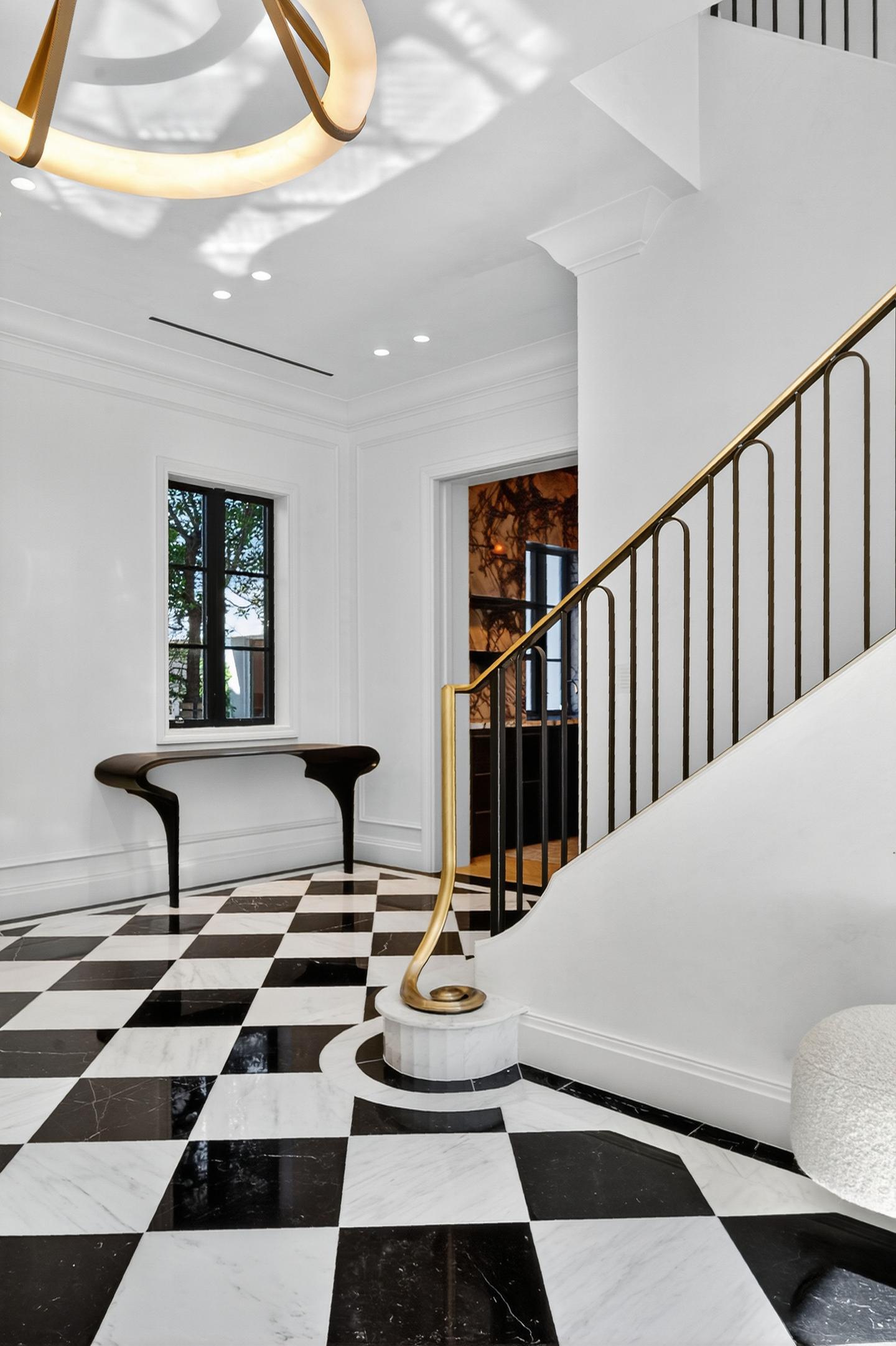 Entry hall and staircase from alternate angle