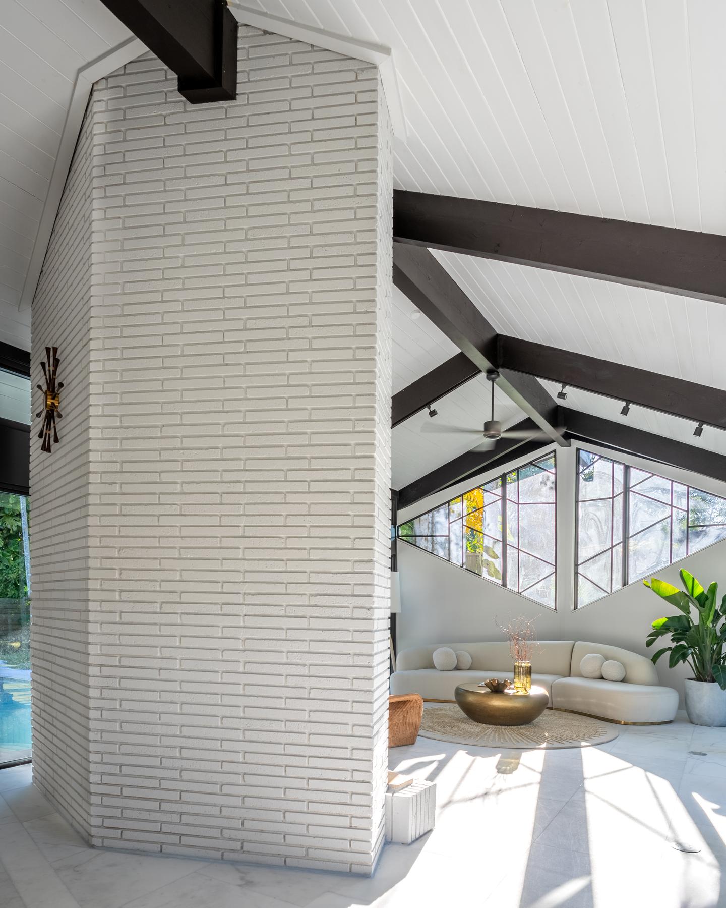Living room with vaulted ceilings and exposed beams