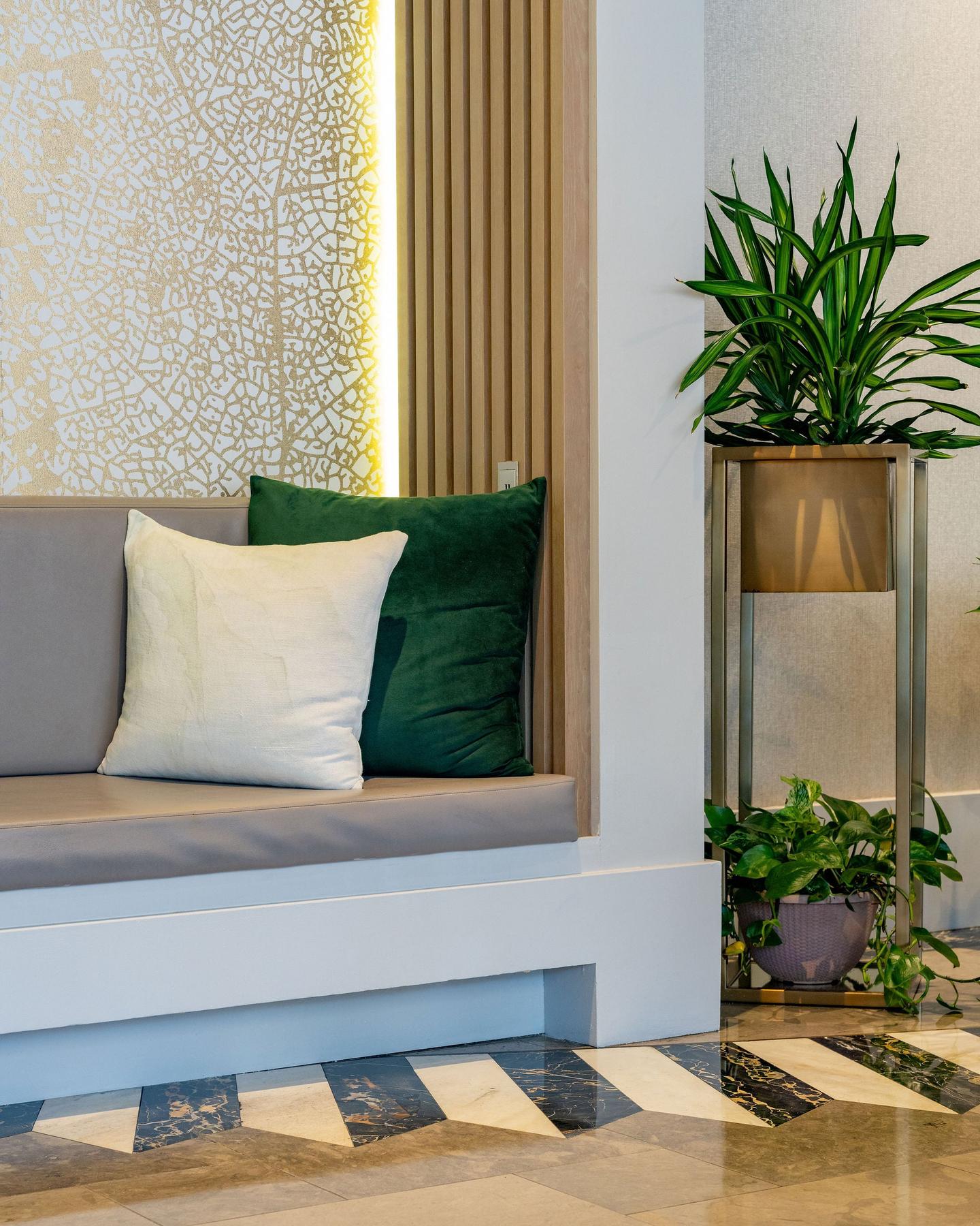 Lobby lounge nook with velvet pillows